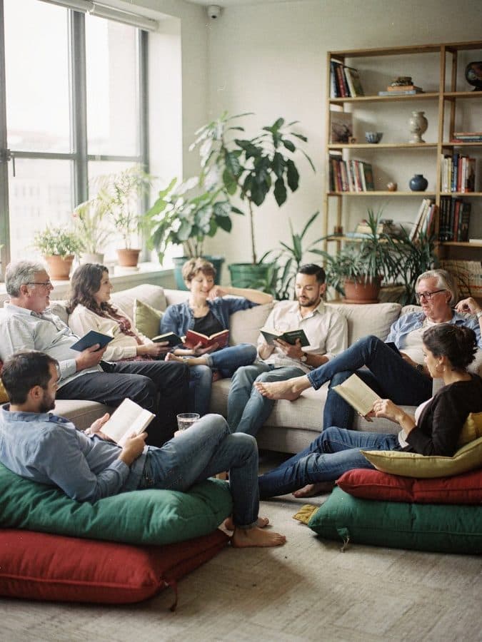 A book club in a bright apartment.